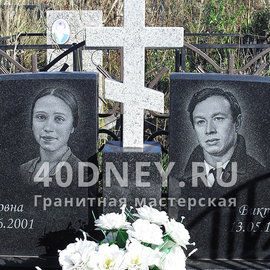 Портреты женщины и мужчины на двойном памятнике
